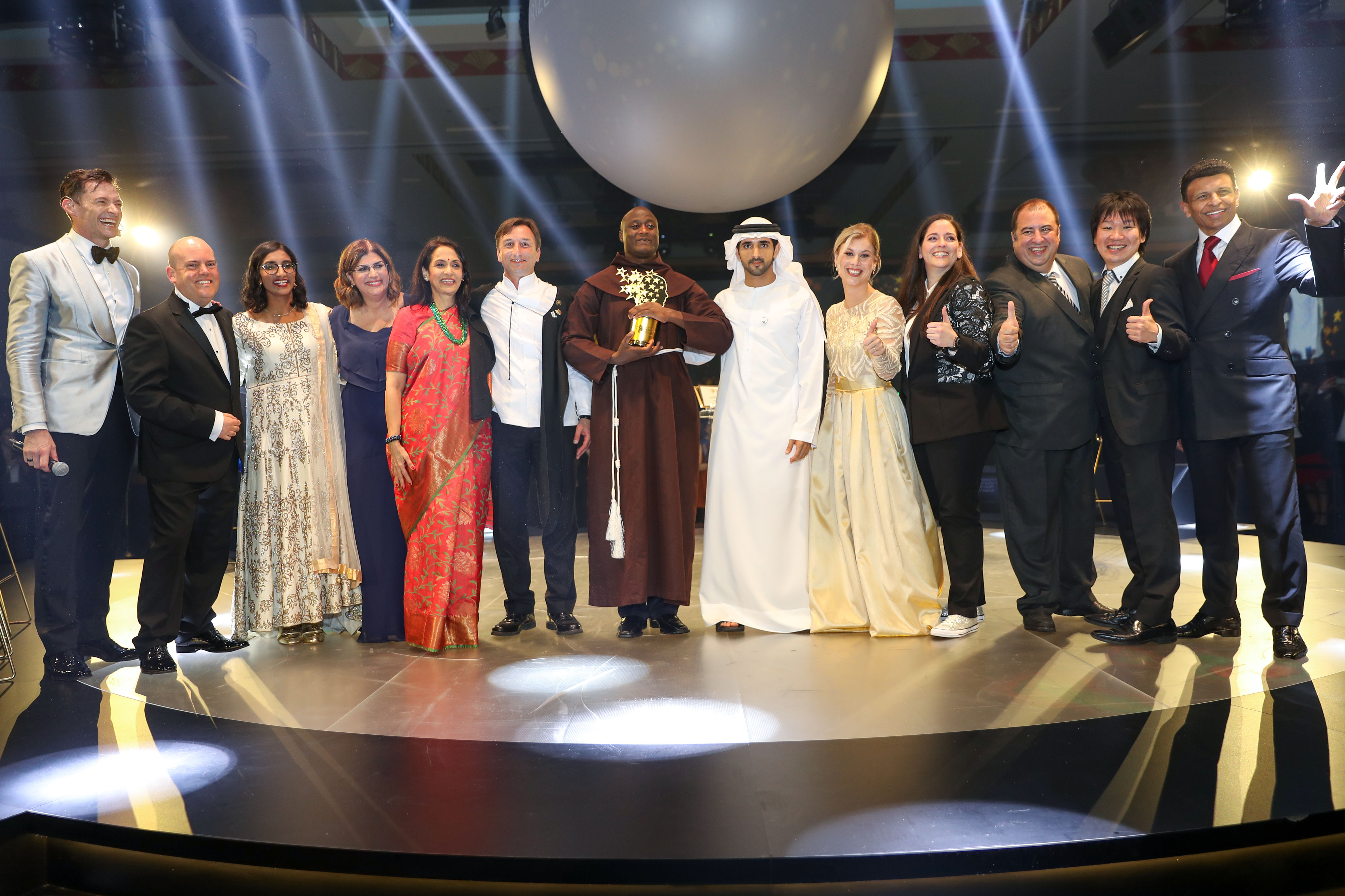 Image result for Tibichi takes the overall winner on Global Teacher award in dubai